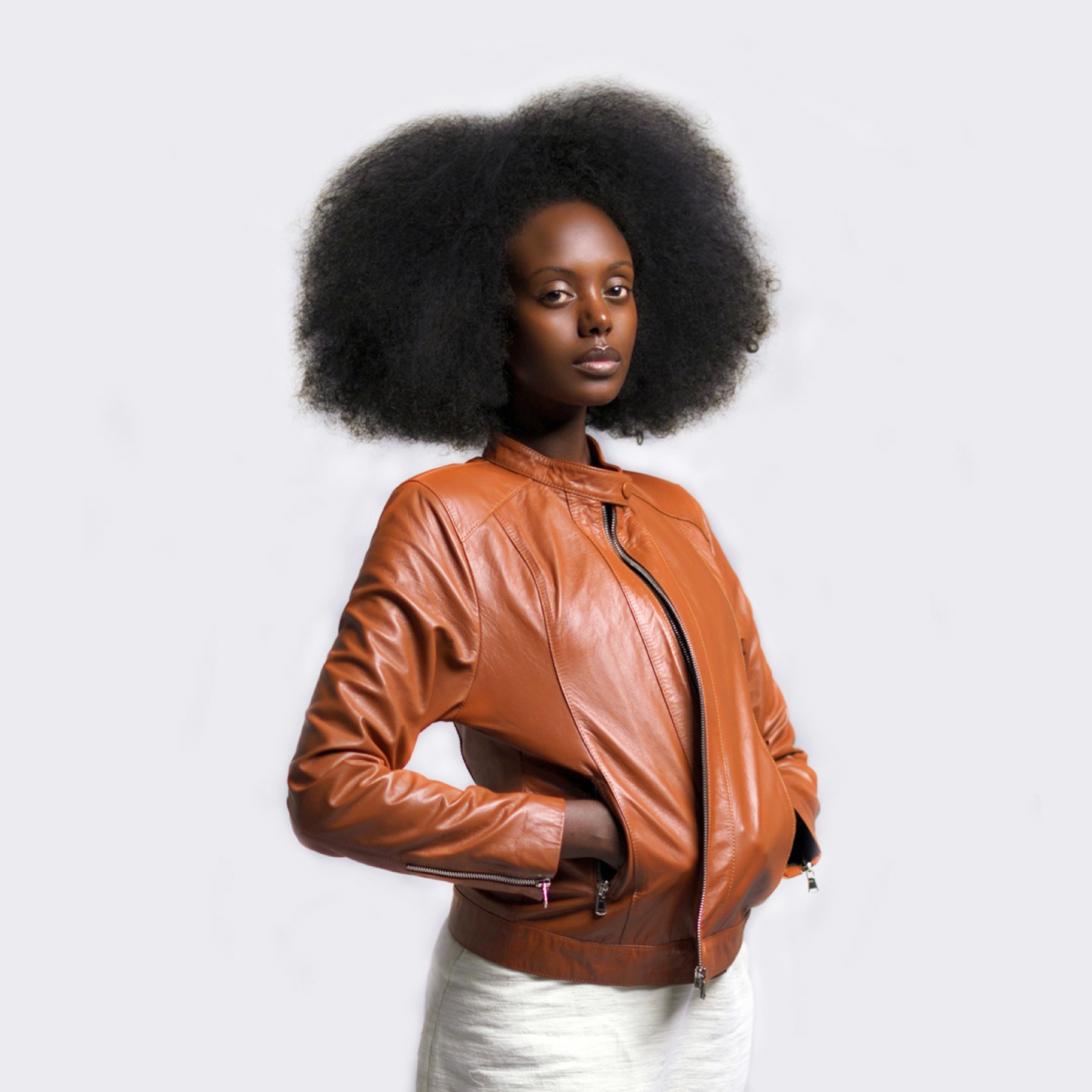 Model wearing finished cognac leather jacket at AALF runway